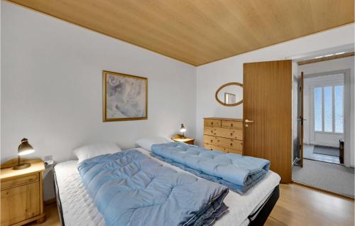 Postel nebo postele na pokoji v ubytování 3 Bedroom Lovely Home In Ulfborg