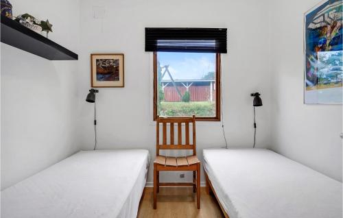 Postel nebo postele na pokoji v ubytování 2 Bedroom Amazing Home In Ebeltoft