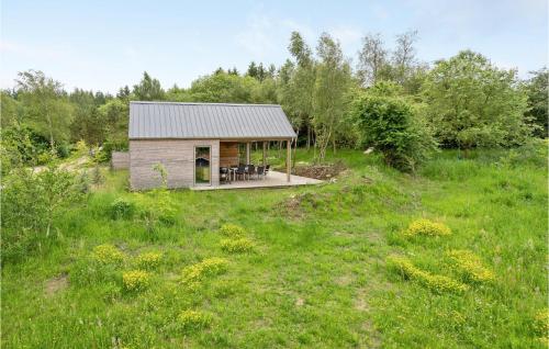 a small cabin in the middle of a field at 3 Bedroom Gorgeous Home In Silkeborg in Silkeborg