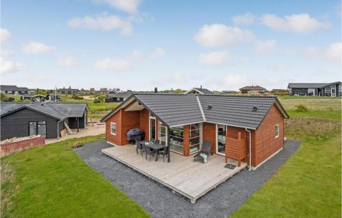a home with a deck and a house at Nice Home In Slagelse With Wifi in Slagelse