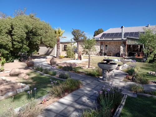 Сад в Oudeklip Guesthouse Nieuwoudtville