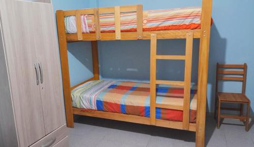 Palanda nebo palandy na pokoji v ubytování IntiPunku