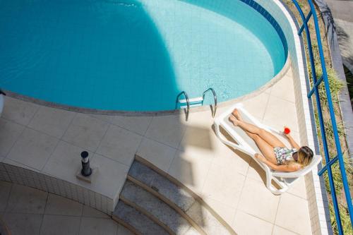 Bazén v ubytování Classe Apart Hotel nebo v jeho okolí