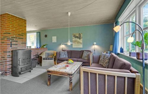 Et opholdsområde på Holiday Home Gl Mælkevej Iv