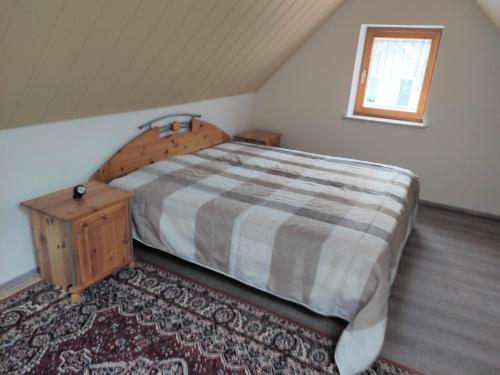 Giường trong phòng chung tại Ferienwohnung im Werratal