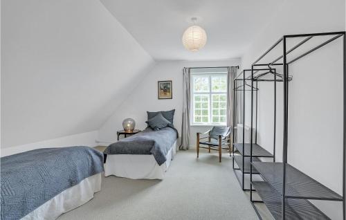 Una cama o camas en una habitación de Rimersgaard