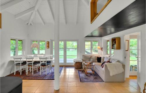 a living room with a couch and a table at Amazing Home In Martofte With Wifi in Martofte
