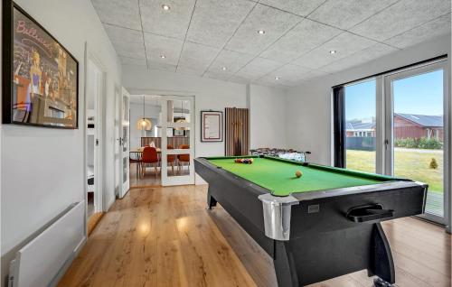 a billiard room with a pool table in it at Four-Bedroom Holiday Home Haderslev With A Room Hot Tub 08 in Knud