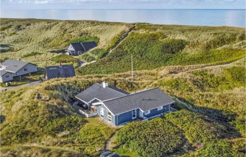 an aerial view of a house on a hill at Holiday Home Tingodden Hvide Sande Iv in Hvide Sande