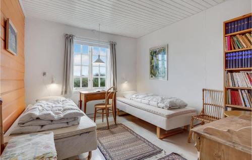 Beautiful Home In Rømø With Wifiにあるベッド