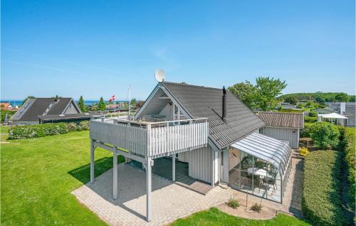 an overhead view of a house with a balcony at Holiday Home Strandvænget Bogense Denm in Bogense