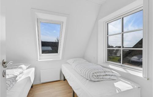 Gorgeous Apartment In Rønne With Wifiにあるベッド