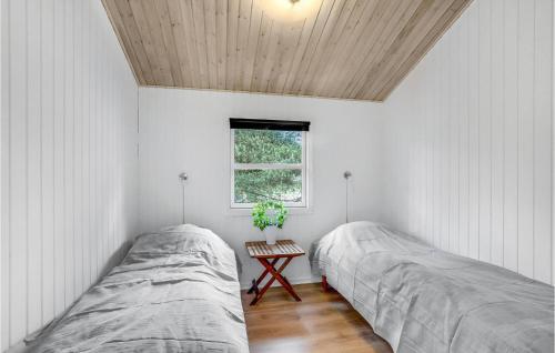 Katil atau katil-katil dalam bilik di Holiday Home Blåbærstien Fjerritslev Ii