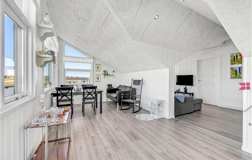 a living room with a couch and a table at Two-Bedroom Holiday Home In Lemvig in Lemvig