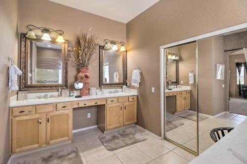 a bathroom with two sinks and a shower at Phoenix Home with Private Pool about 8 Mi to Dtwn in Phoenix