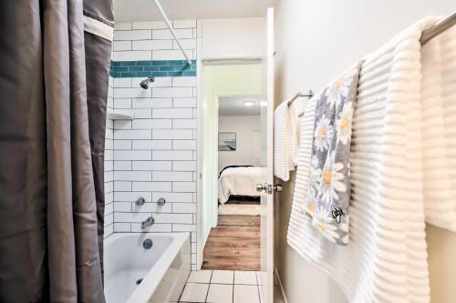 a bathroom with a tub and a walk in shower at Quiet Carpinteria Cottage By Town and Beaches in Carpinteria