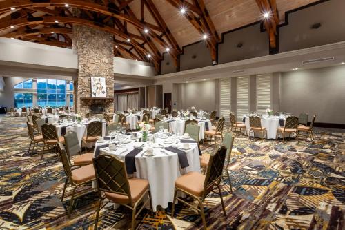 a large banquet room with tables and chairs at Grandover Resort & Spa, a Wyndham Grand Hotel in Greensboro