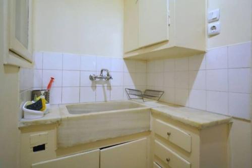 Kuchyň nebo kuchyňský kout v ubytování Apartment with private patio