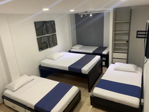 Postel nebo postele na pokoji v ubytování Hotel Travelers Sport