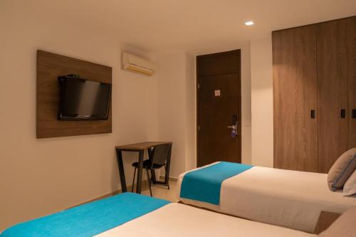 Hotel San Gabrielにあるベッド