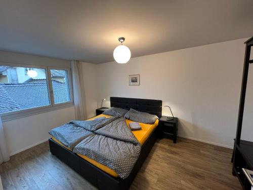 Säng eller sängar i ett rum på Apartment No 7 Mythenblick Schwyz 10 Min to Stoos