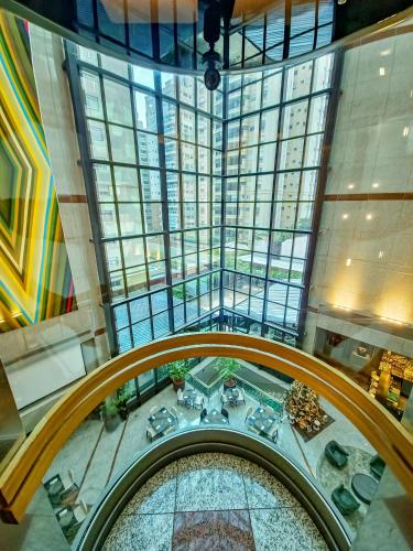 an overhead view of a building with a large window at Laghetto Stilo São Paulo in Sao Paulo