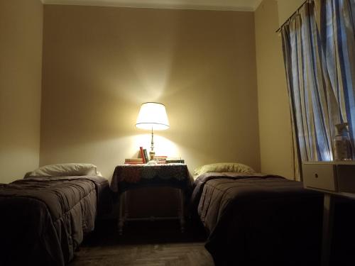 Una cama o camas en una habitación de Altos de Quintana Alojamiento compartido