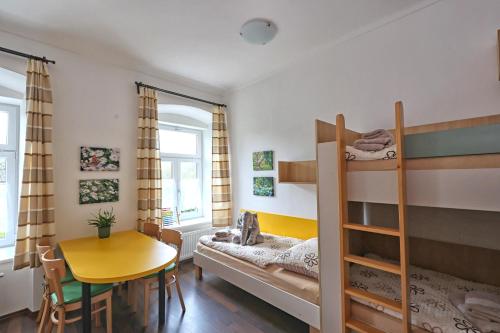 Postel nebo postele na pokoji v ubytování Apartmány U Aloise