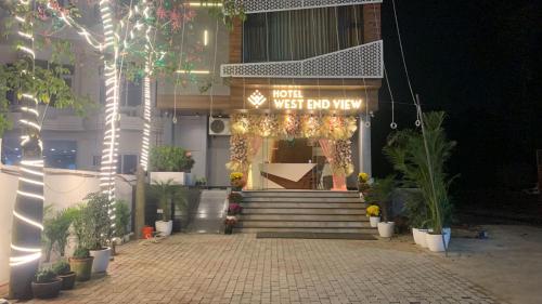 a building with a sign that reads west end way at Hotel West End View in Zirakpur