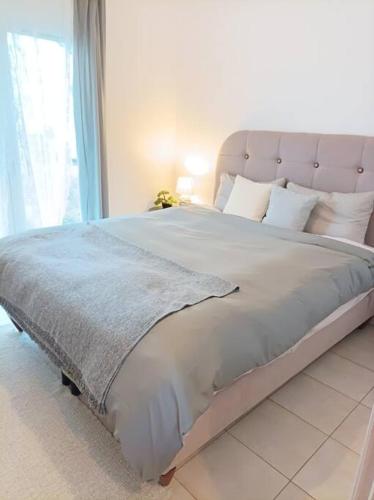 Postel nebo postele na pokoji v ubytování Comfy Cozy Iksia