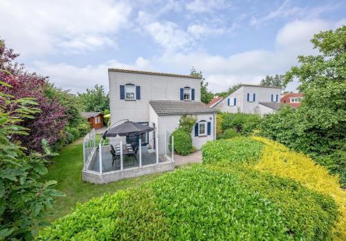 an aerial view of a house with a garden at Private, 5-star vacation home on a beautiful island in De Cocksdorp