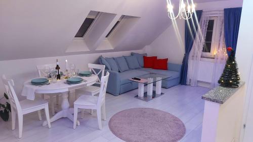 Χώρος καθιστικού στο Apartamenty Malwa