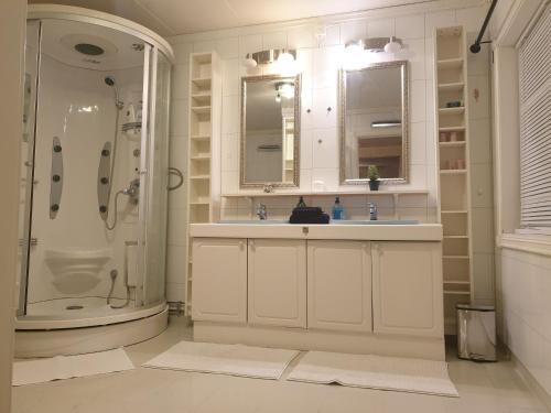 a bathroom with a shower and a sink at Holiday Home in Gol