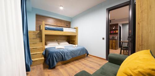Postel nebo postele na pokoji v ubytování New Gudauri Redco F4 Two-room apartment