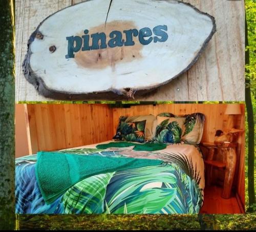 a bedroom with a bed with a surfboard on it at Casa Mujer Villa Agueda in Chocontá