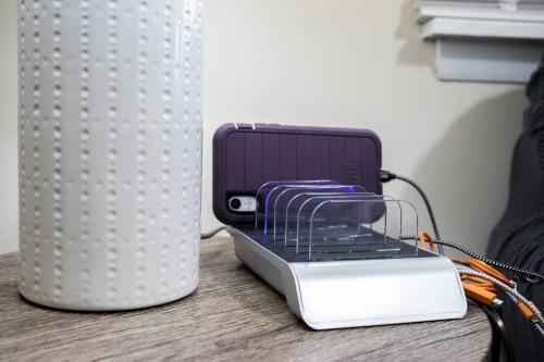 a toaster sitting on a table next to a radiator at {Quiet Suburban Ranch Hot Tub} Mins Arpt/RIT/DWNT in Rochester