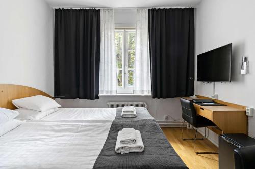 Postel nebo postele na pokoji v ubytování Best Western Hotel Anno 1937