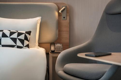 En eller flere senge i et værelse på Holiday Inn Express - Marne-la-Vallée Val d'Europe by IHG