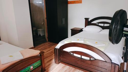 Hospedaje Campestre El Deseoにあるベッド