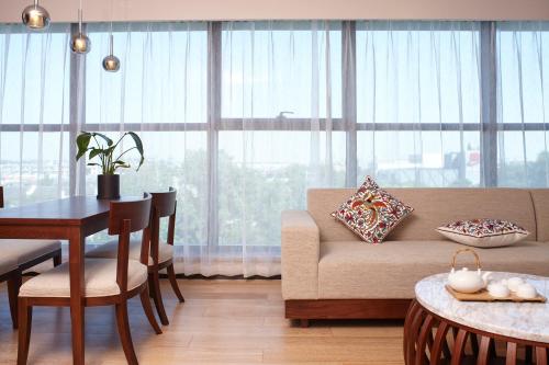 SSAW Boutique Hotel Yangzhouにあるシーティングエリア