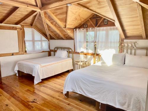 Postel nebo postele na pokoji v ubytování Cabañas el Chalet