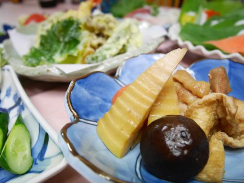 a plate of food with french fries and other foods at 池の平温泉 ロッジ コクハ in Myoko