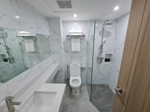 Koupelna v ubytování Thana Wisut Hotel