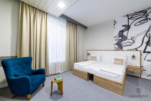 Ліжко або ліжка в номері Hotel Sahat