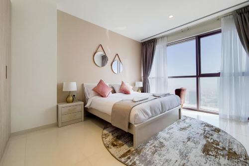 Postel nebo postele na pokoji v ubytování GreenFuture - A A Tower - One Bedroom