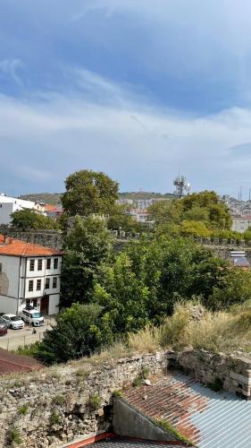 a view of a city with a stone wall at Otel 57 in Sinop