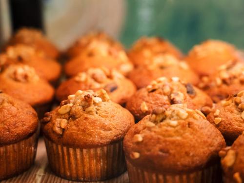 a bunch of muffins sitting on a table at Hotel AreaOne Takamatsu in Takamatsu