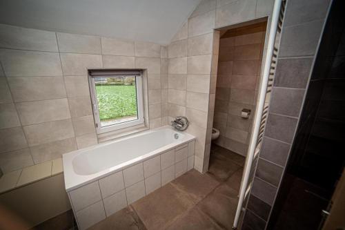 Un baño de Infiniment Vôtre