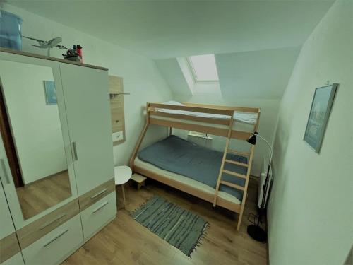 Apartma Butterfly emeletes ágyai egy szobában
