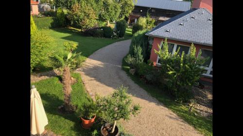 an aerial view of a garden with plants and a house at Villa Lea Lee in Strehlow